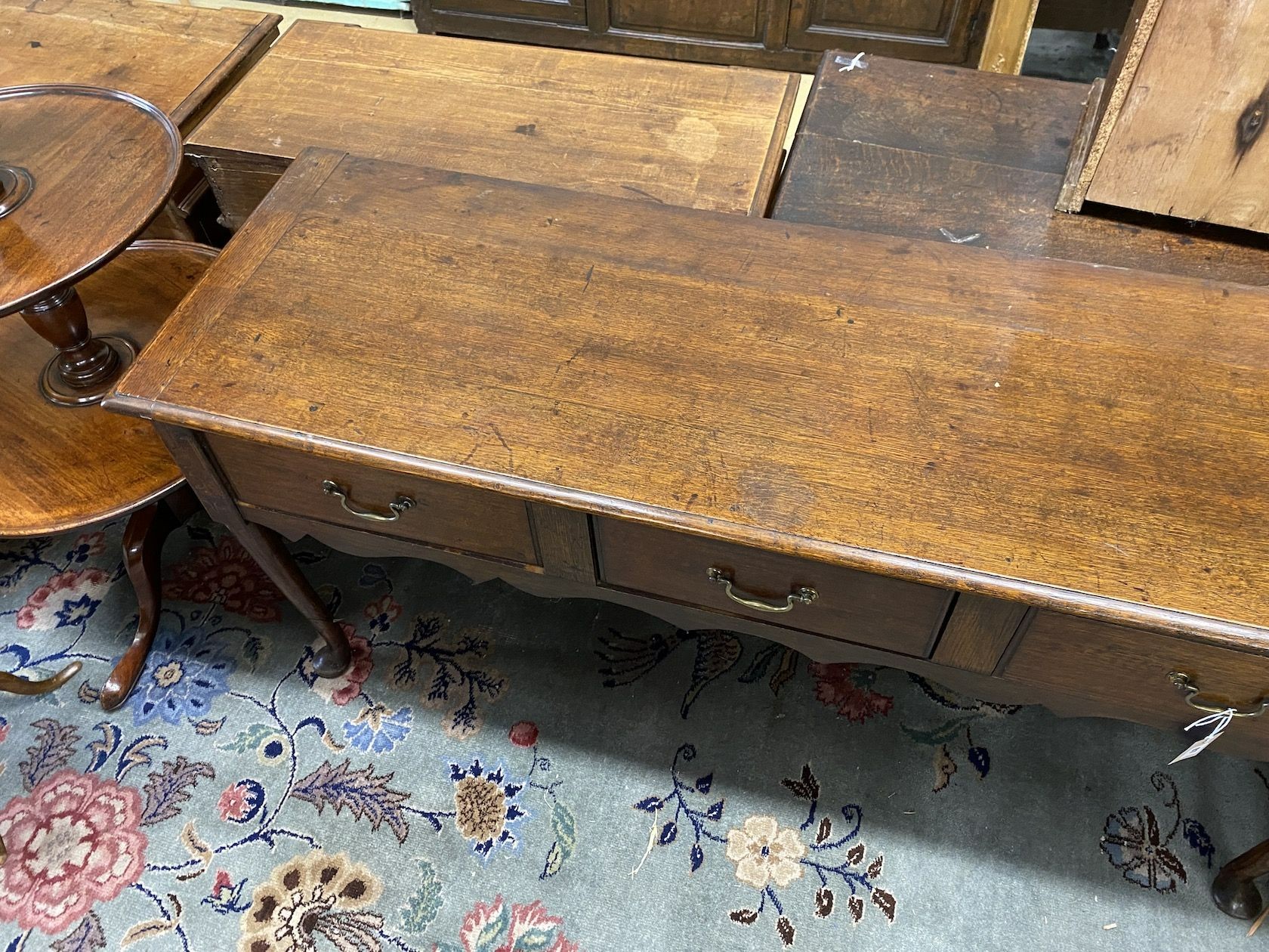 An 18th century and later oak low dresser, length 154cm, depth 51cm, height 73cm